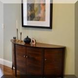 F05. French Heritage Furniture demillune console table. 34”h x 60”w x 16”d 